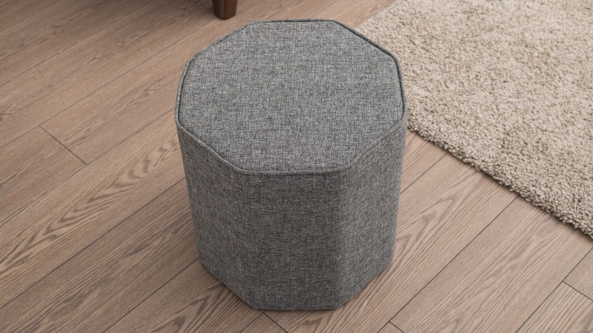 Pouf in tessuto Hexa Grigio