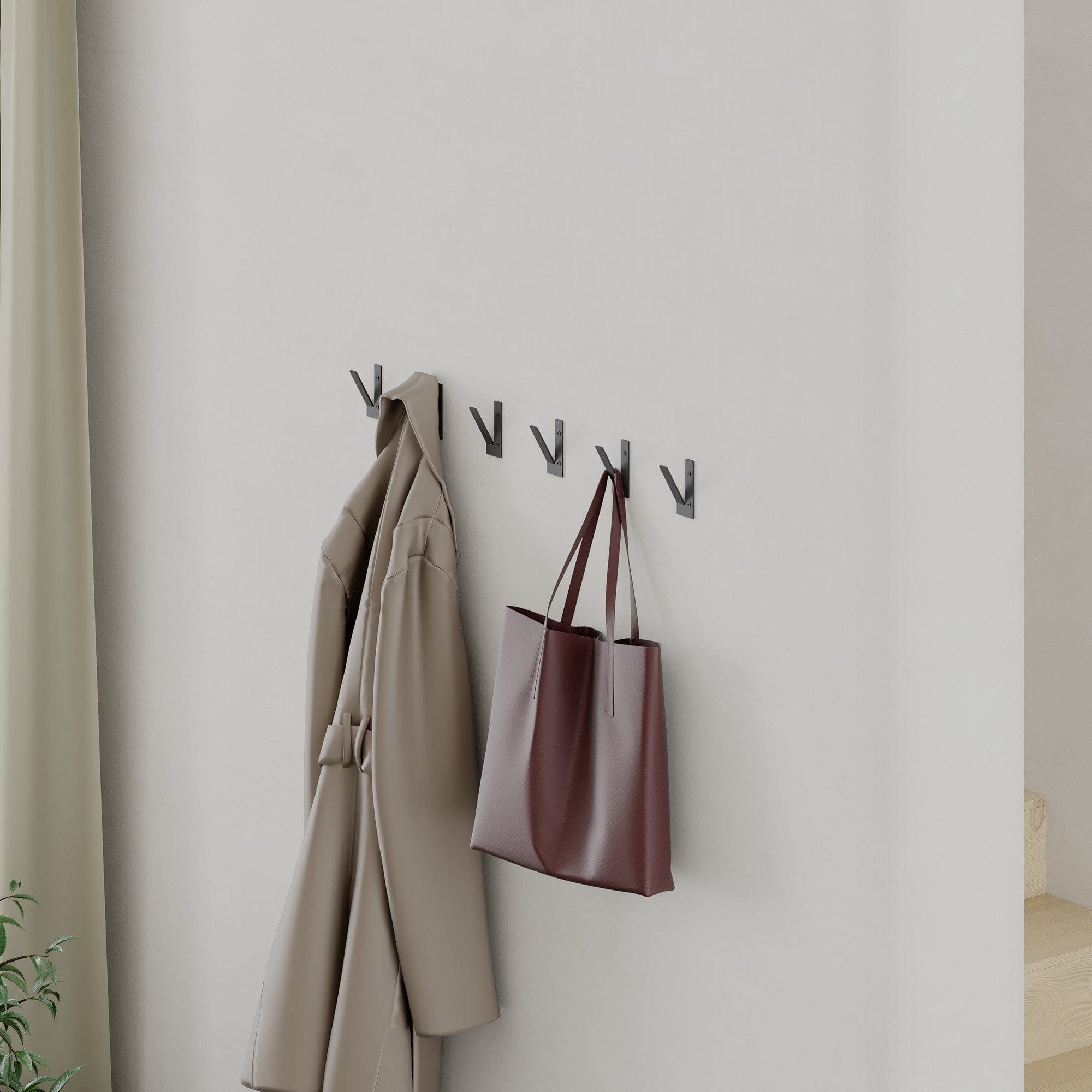 Asir Gancio da parete in metallo Nora Nero